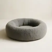 Cama redonda gris para perro